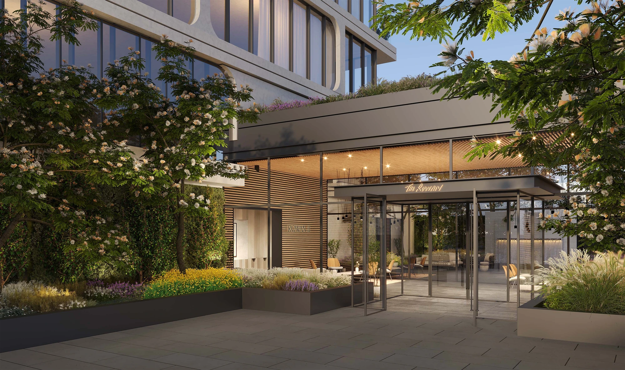 Glass entry with landscaped planting at 21-11 31st Street