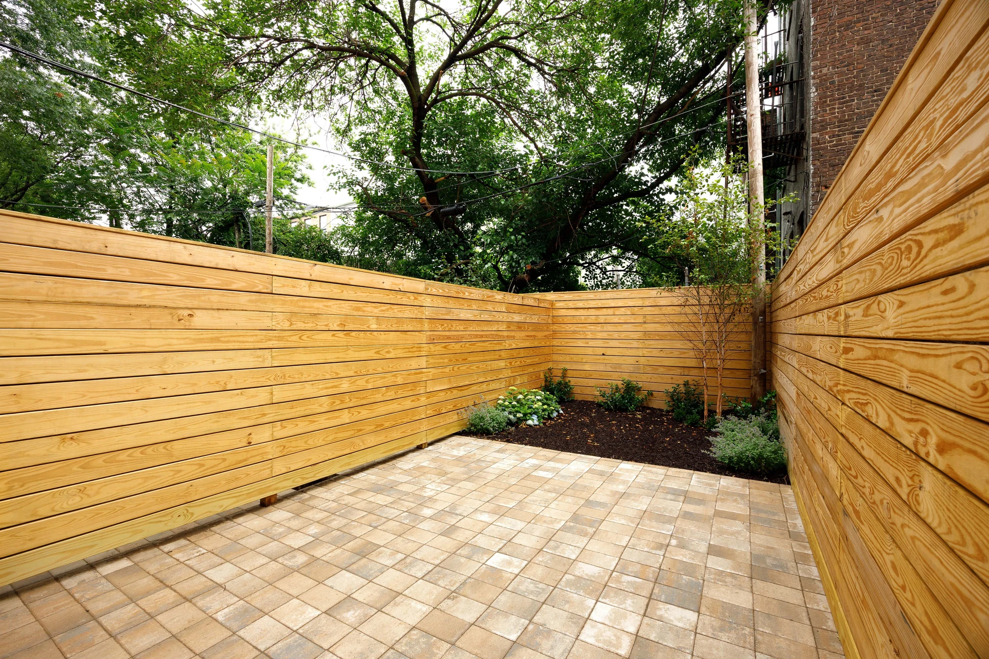 Wide view of the private backyard at 269 Bainbridge Street