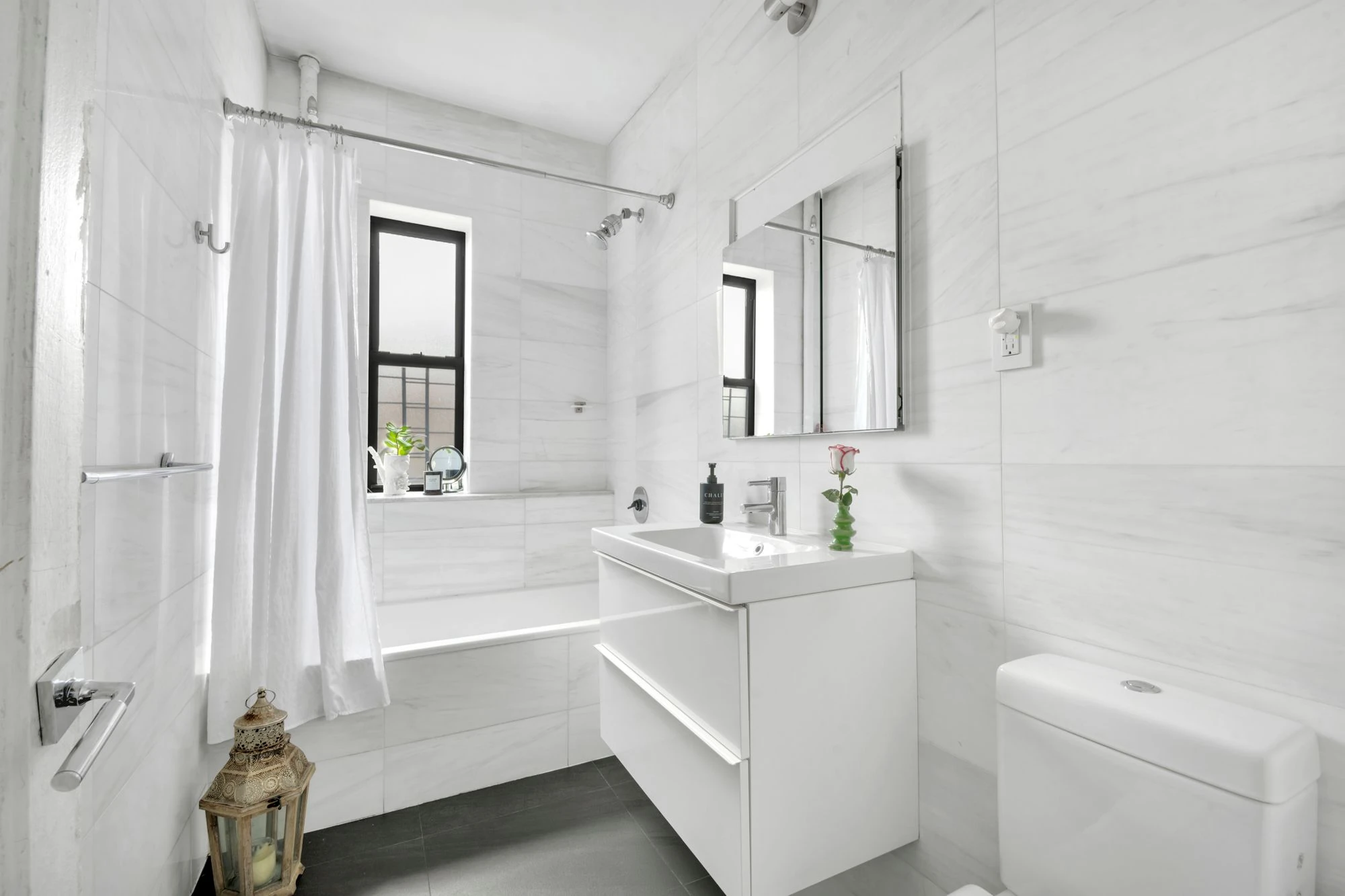 White marble bathroom at 47 Fort Washington Avenue