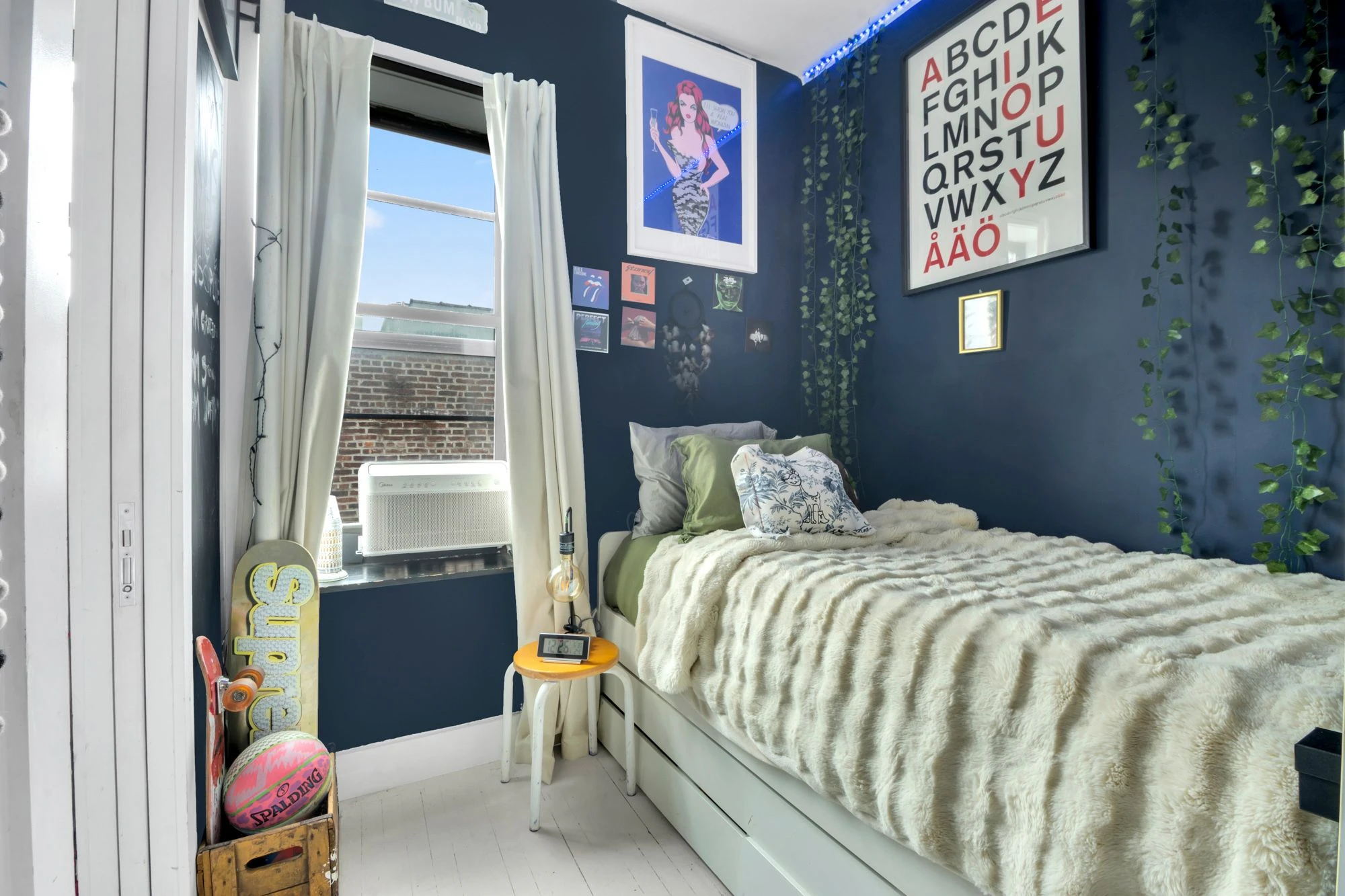 Navy bedroom at 47 Fort Washington Avenue