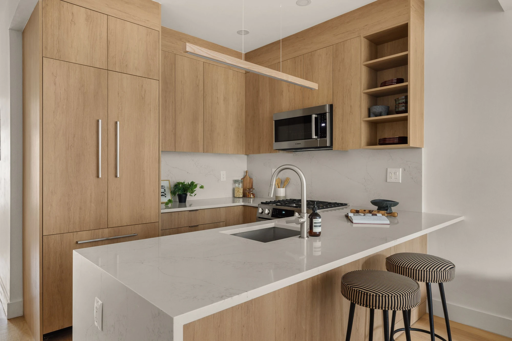 Light-wood kitchen at 1230 Putnam Avenue