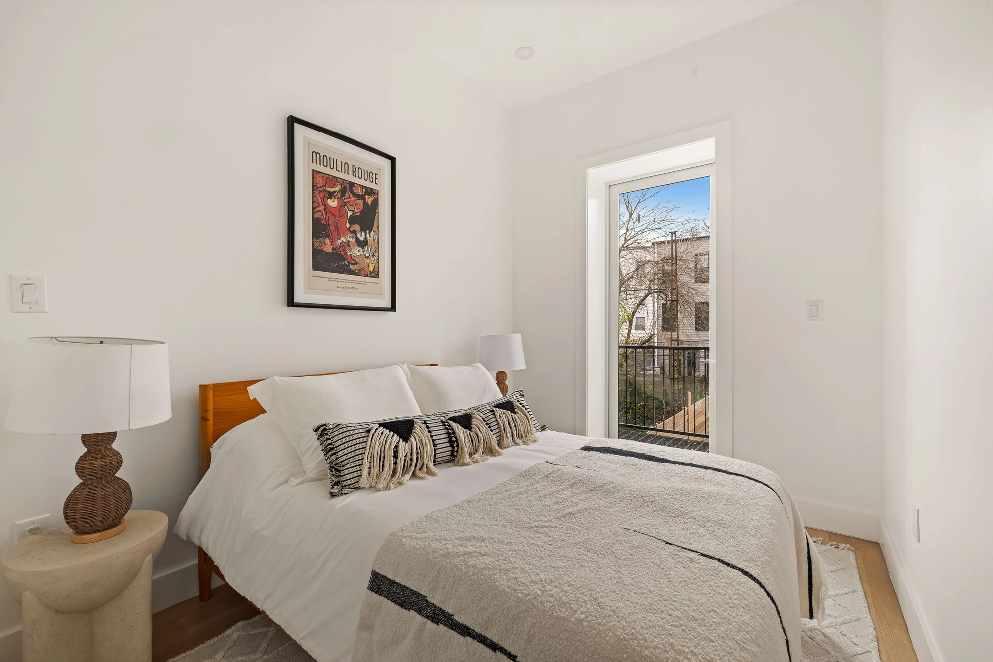 Second bedroom with broad glass door at 1230 Putnam Avenue