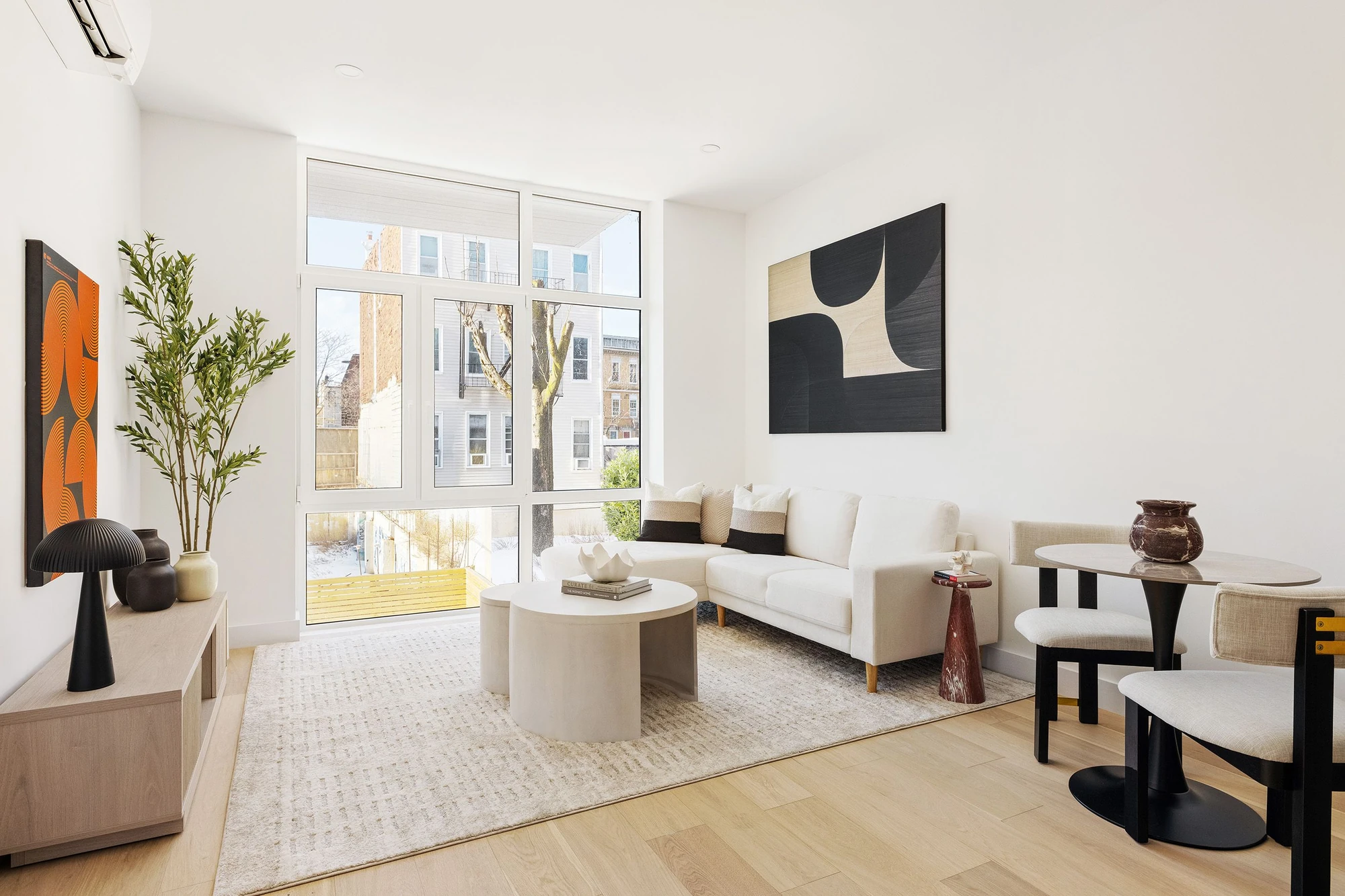 Bright living room with broad windows at 301 Stockholm Street