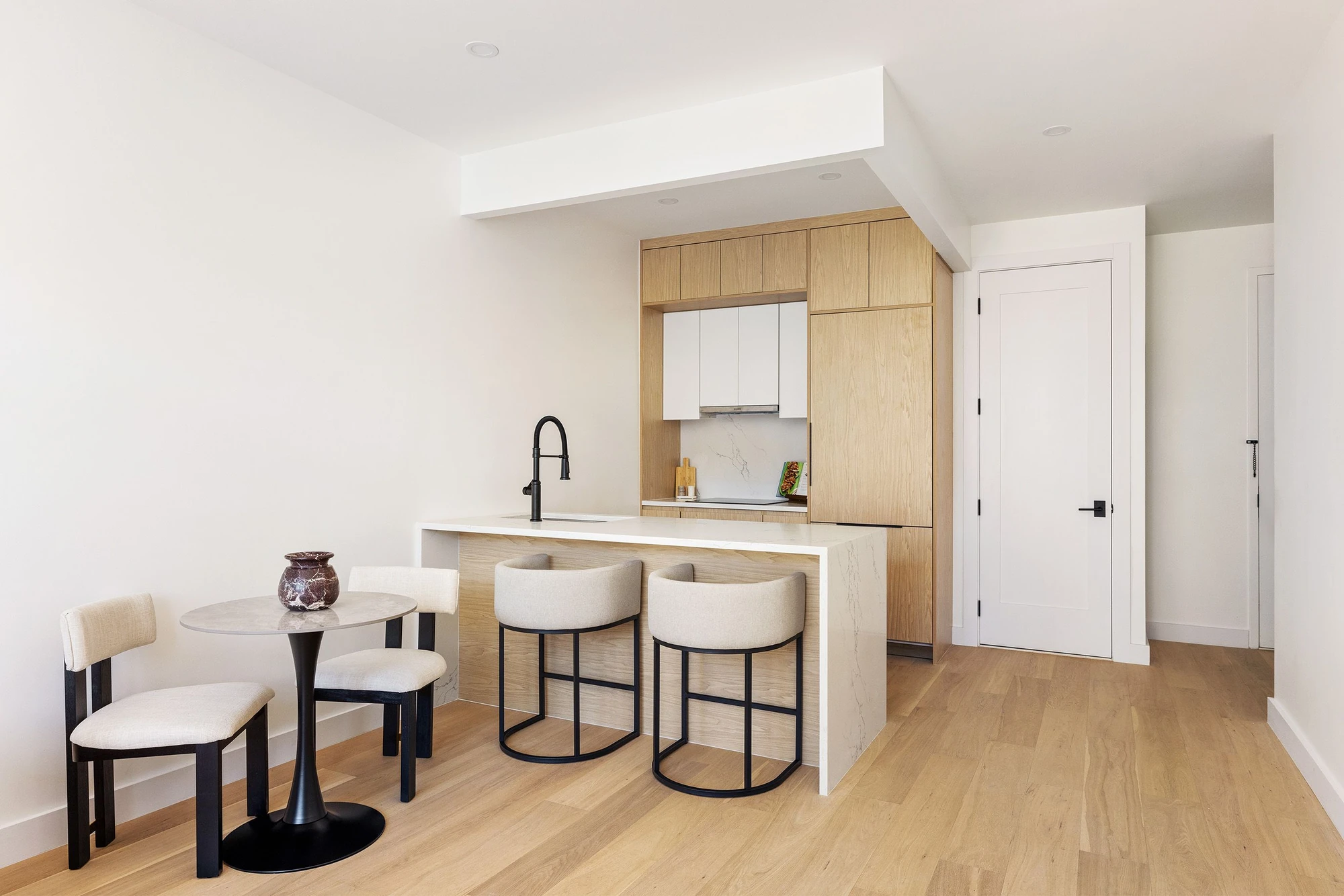 Open kitchen and dining area at 301 Stockholm Street