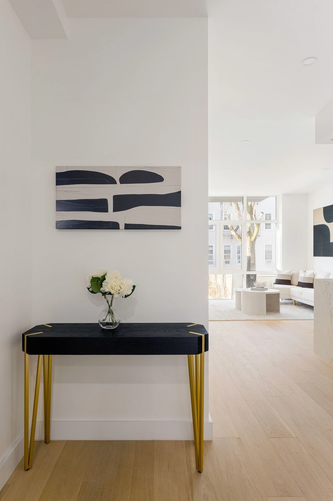 Light-wood entry hall at 301 Stockholm Street