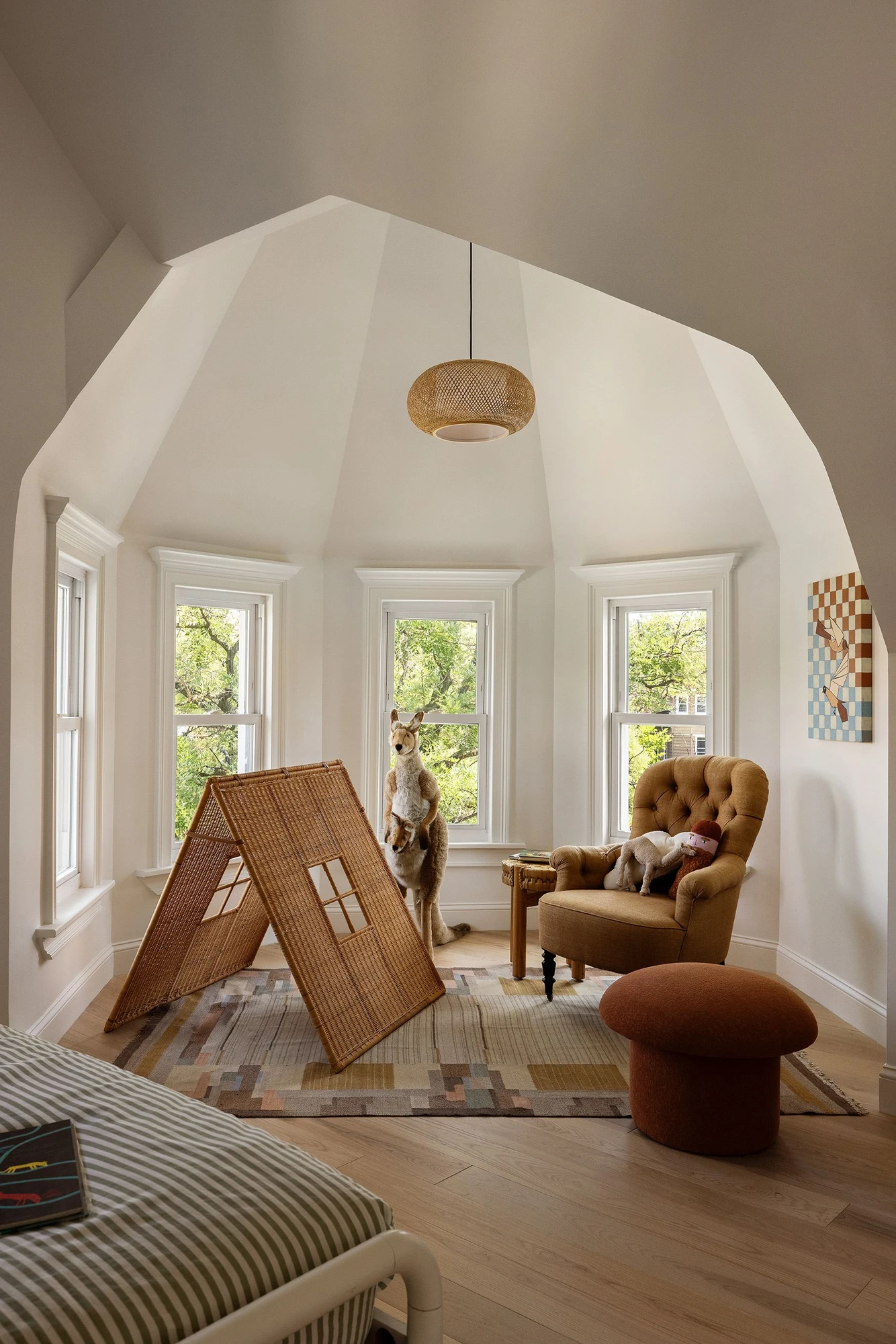 Closer view of a faceted window alcove beneath the vaulted bedroom roofline at 534 East 24th Street