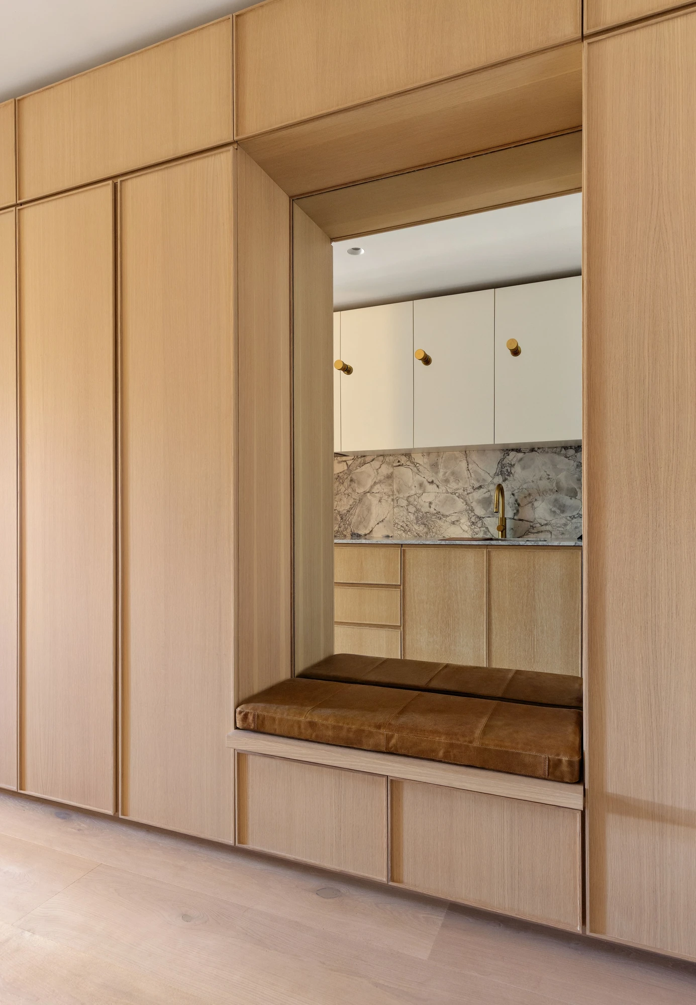 Built-in bench beside the kitchen cabinetry at 537 Clinton Street #3B; listing notes some images are virtually staged