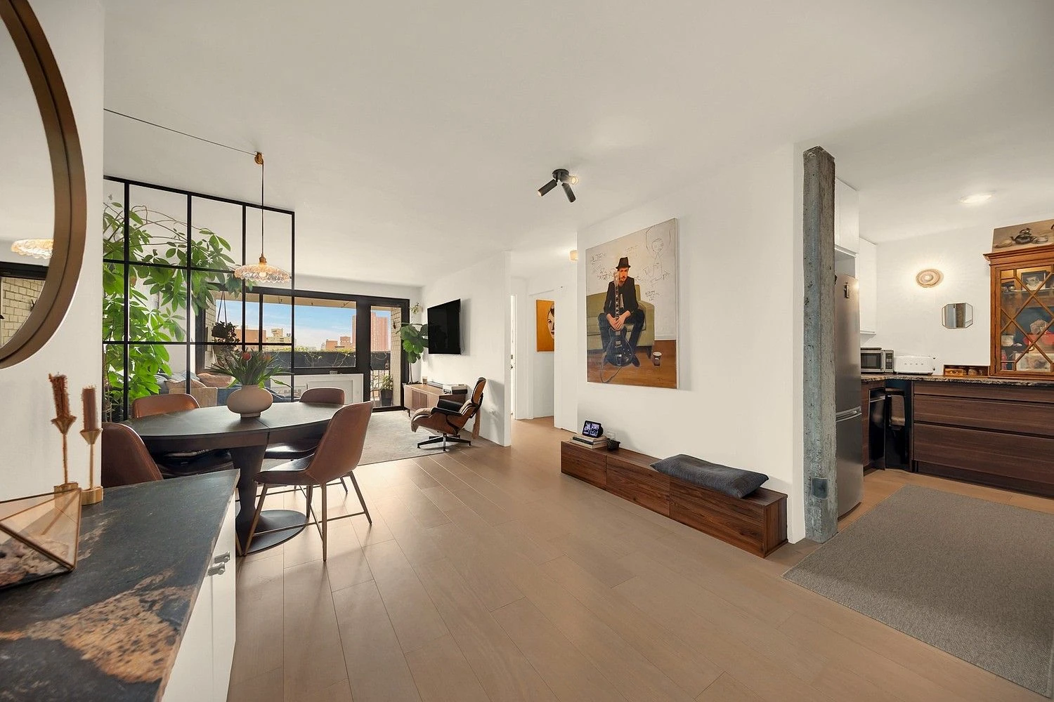 Dining area opening toward the living room at 90 Gold Street #21F