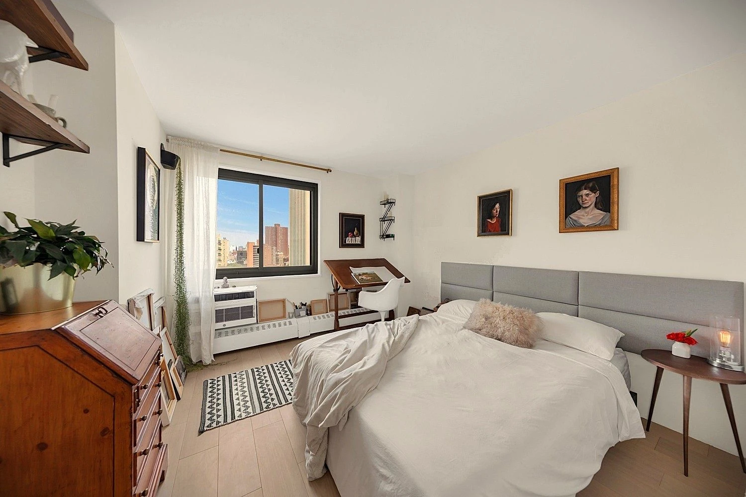 Bedroom with a window beside the bed at 90 Gold Street #21F