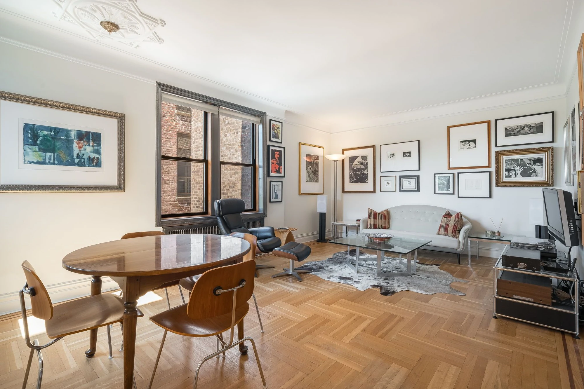 Dining table beside the living area at 1710 Avenue H #C5