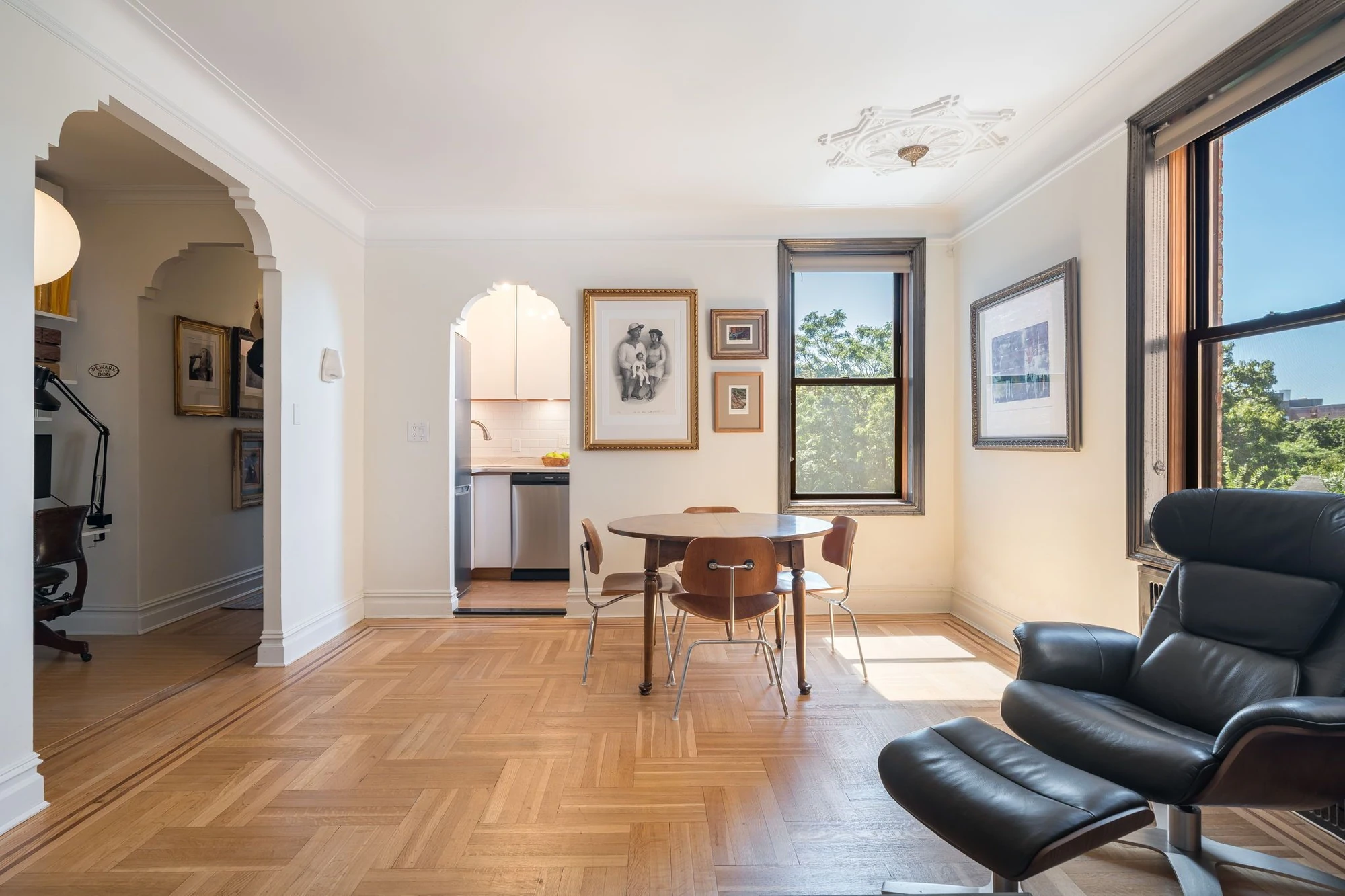 Arched doorways beside a dining table at 1710 Avenue H #C5