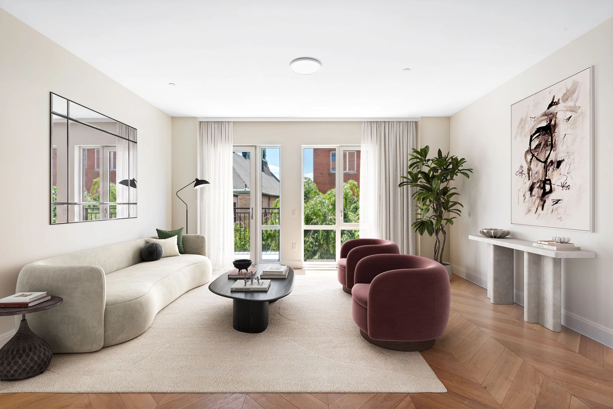 Living room with chevron-pattern wood flooring and glazed balcony doors at 222 16th Street #4C