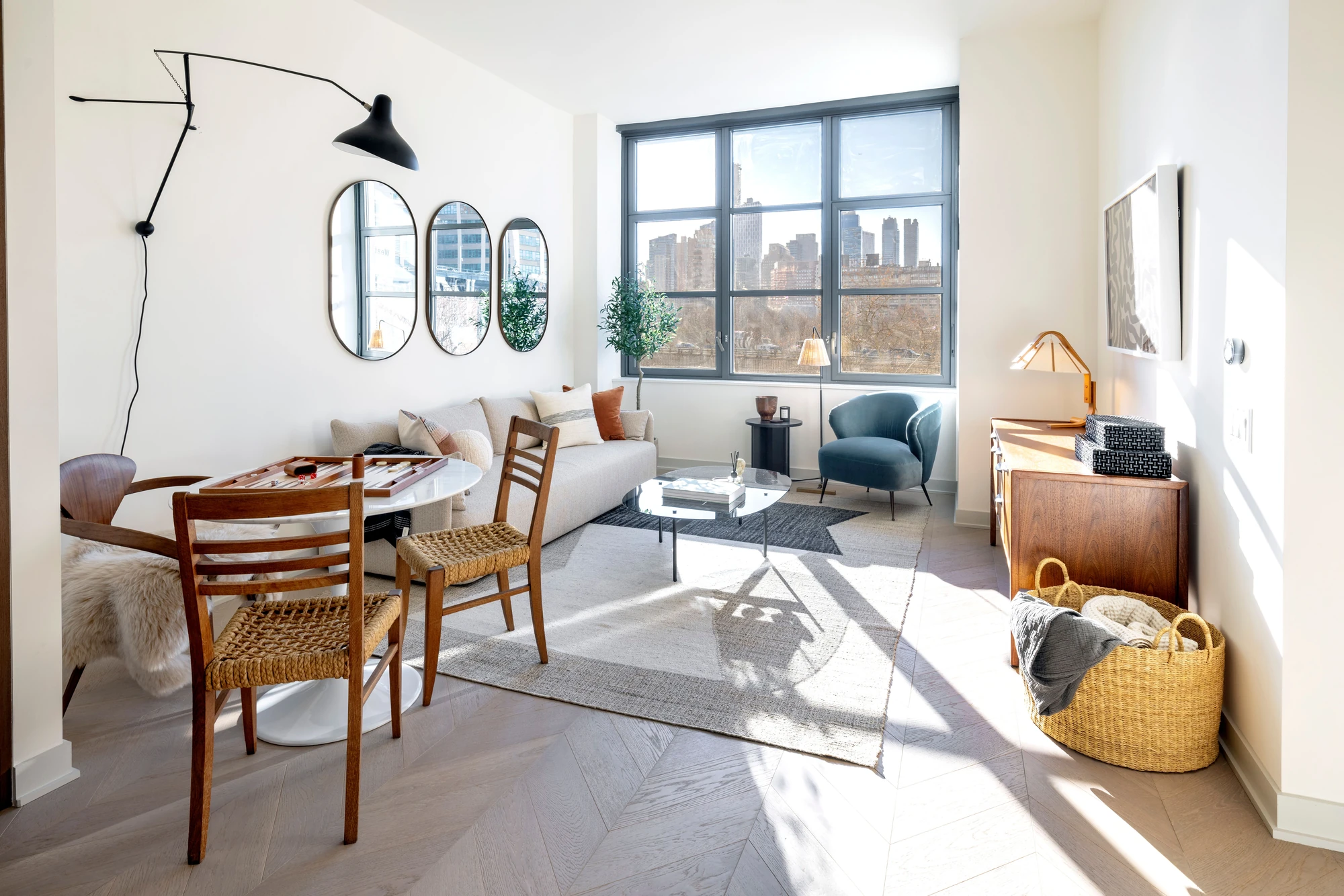 Broker-supplied living and dining image beside divided-light windows; exact-unit attribution unconfirmed at 115 York Street #4A–York