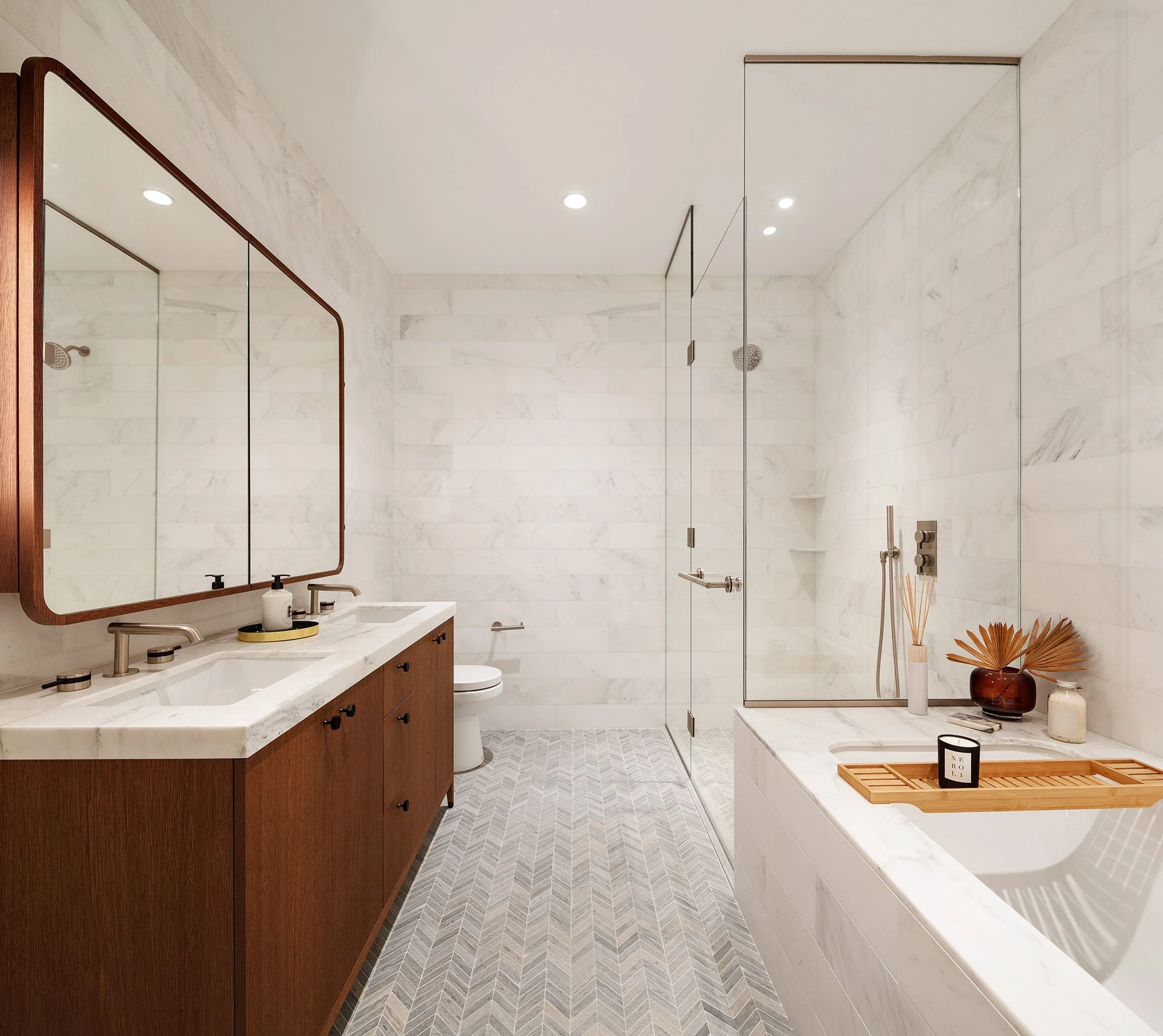Broker-supplied marble bathroom image with a wood vanity; exact-unit attribution unconfirmed at 115 York Street #4A–York