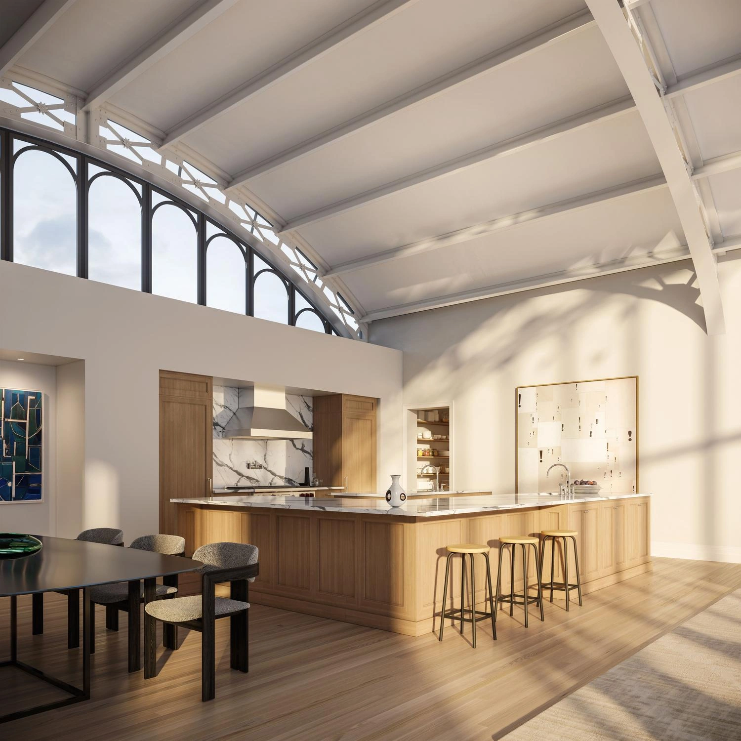 Chef's kitchen with marble countertops below exposed beams and arched clerestory windows